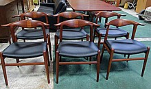 teak dining room chairs designed by Hans Wegner for Johannes Hansen